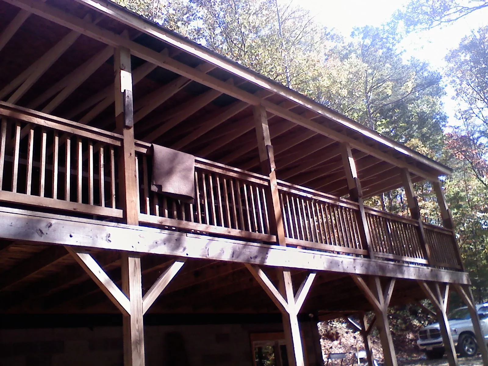 Timber framing under a new elevated porch and deck — Roof Leak Repair in Maybrook by Roofing Brothers